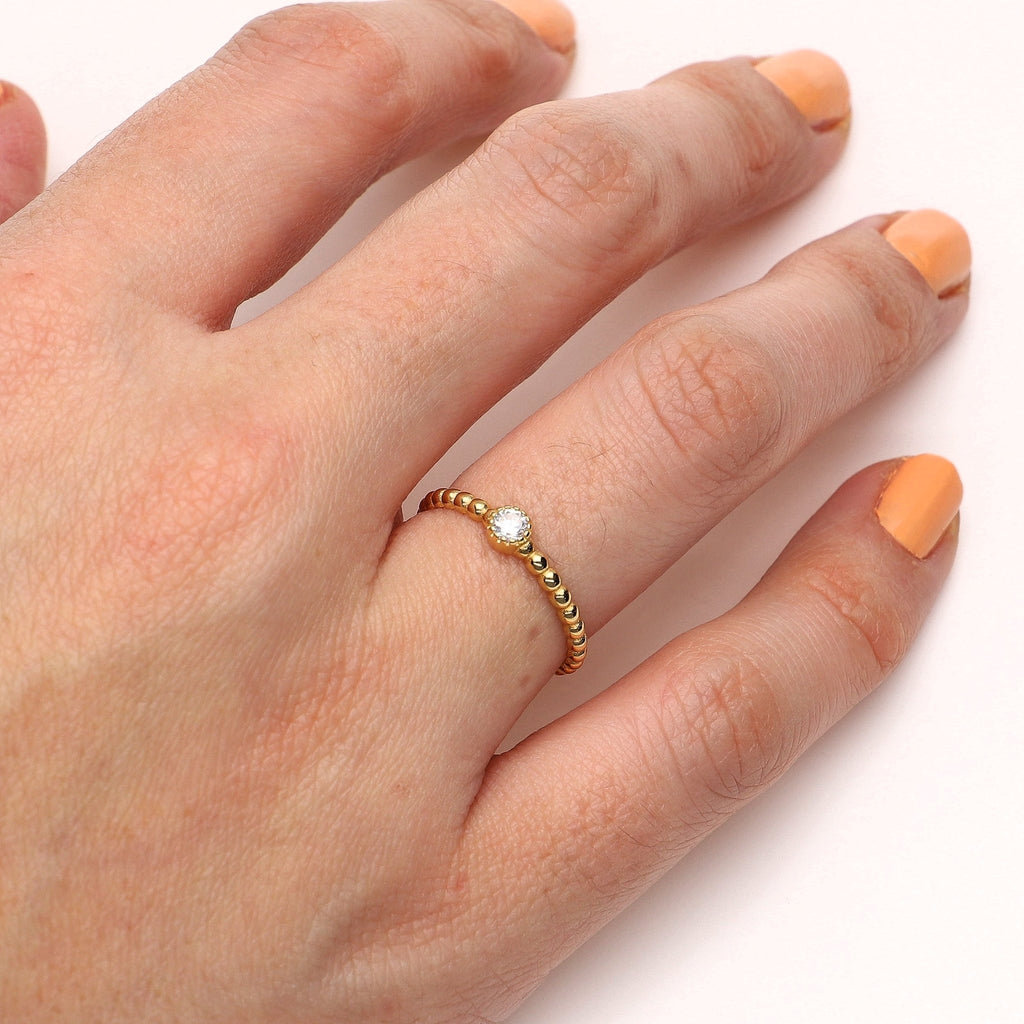 Anillo Oro Amarillo 18kt con Circón, AN2106036 - Joyería Rometsch